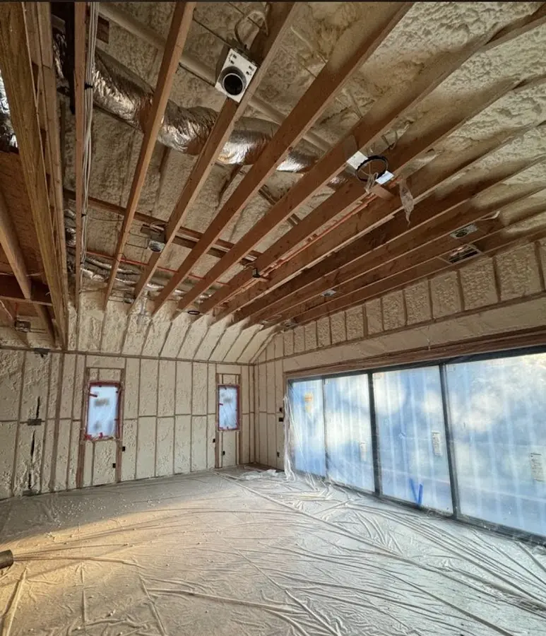 Interior walls and ceiling insulated with spray foam during new construction in Rowlett